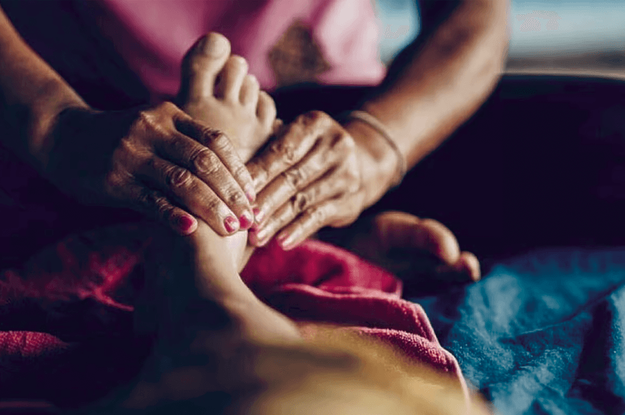Massage session during a revitalizing yoga retreat in Portugal